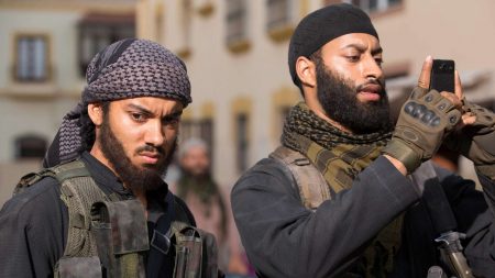 Watching a public beheading, Jalal (Sam Otto) begins to question Islamic State. 